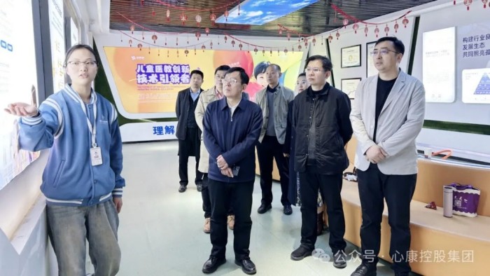 江苏省泰州市残联考察调研UG环球360控股集团